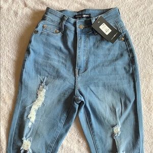 Fashion Nova high rise ripped jeans.